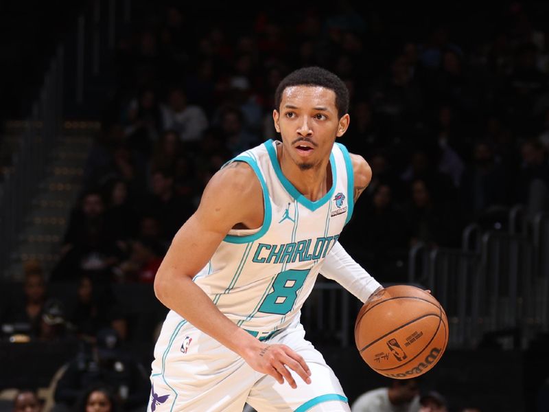 WASHINGTON, DC -? MARCH 8: Nick Smith Jr. #8 of the Charlotte Hornets handles the ball during the game  on March 8, 2024 at Capital One Arena in Washington, DC. NOTE TO USER: User expressly acknowledges and agrees that, by downloading and or using this Photograph, user is consenting to the terms and conditions of the Getty Images License Agreement. Mandatory Copyright Notice: Copyright 2024 NBAE (Photo by Stephen Gosling/NBAE via Getty Images)