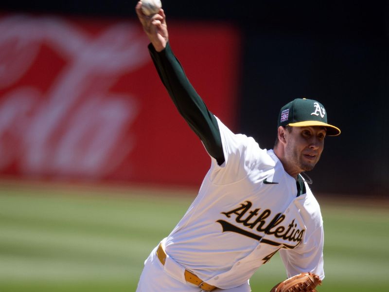 Jul 20, 2024; Oakland, California, USA; Oakland Athletics starting pitcher Mitch Spence (40) delivers a pitch against the Los Angeles Angels during the first inning at Oakland-Alameda County Coliseum. Mandatory Credit: D. Ross Cameron-USA TODAY Sports