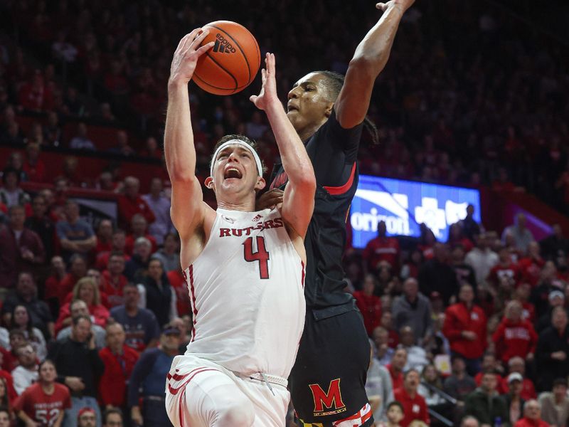 Jan 5, 2023; Piscataway, New Jersey, USA; Rutgers Scarlet Knights guard Paul Mulcahy (4) is fouled by Maryland Terrapins forward Julian Reese (10) while driving to the basket during the second half at Jersey Mike's Arena. Mandatory Credit: Vincent Carchietta-USA TODAY Sports