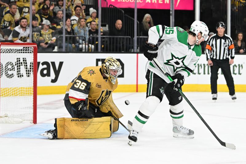 Apr 27, 2024; Las Vegas, Nevada, USA; Vegas Golden Knights goaltender Logan Thompson (36) stops a shot behind Dallas Stars center Matt Duchene (95) in overtime in game three of the first round of the 2024 Stanley Cup Playoffs at T-Mobile Arena. Mandatory Credit: Candice Ward-USA TODAY Sports