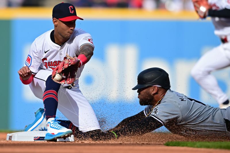 Apr 8, 2024; Cleveland, Ohio, USA; Chicago White Sox third base Yoan Moncada (10) steals second base during the first inning against the Cleveland Guardians at Progressive Field. Mandatory Credit: David Dermer-USA TODAY Sports