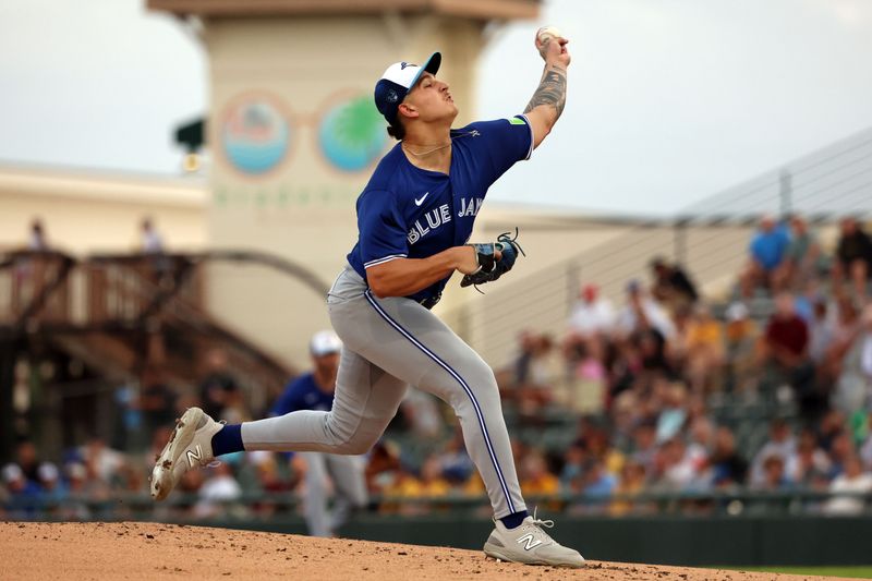 Mar 21, 2024; Bradenton, Florida, USA; Toronto Blue Jays pitcher Ricky Tiedemann (70) throws a pitch during the first inning against the Pittsburgh Pirates at LECOM Park. Mandatory Credit: Kim Klement Neitzel-USA TODAY Sports