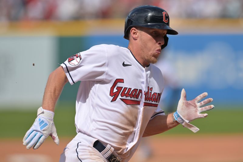 May 28, 2023; Cleveland, Ohio, USA; Cleveland Guardians center fielder Myles Straw (7) rounds third base en route to scoring during the ninth inning against the St. Louis Cardinals at Progressive Field. Mandatory Credit: Ken Blaze-USA TODAY Sports