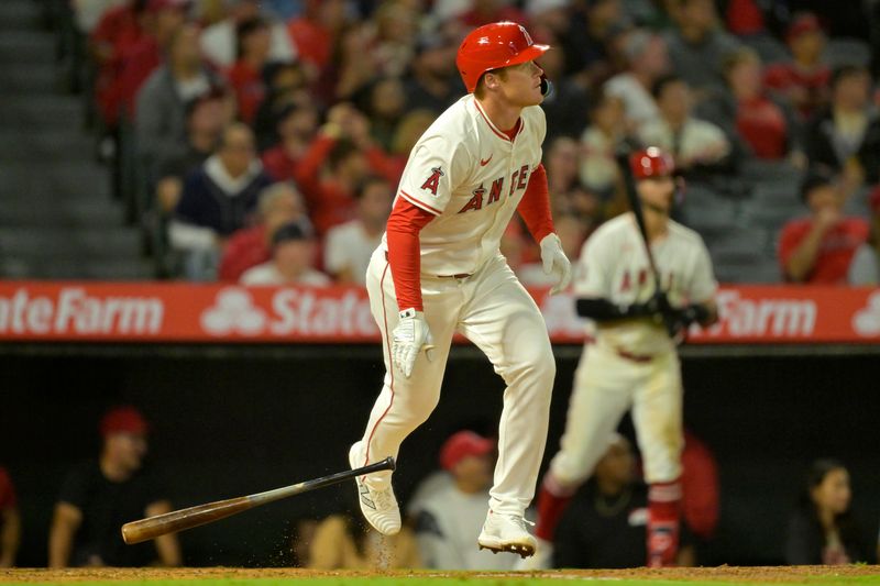 Sep 17, 2024; Anaheim, California, USA;  Los Angeles Angels third baseman Eric Wagaman (34) watches the flight of the ball on a solo home run in the sixth inning against the Chicago White Sox at Angel Stadium. Mandatory Credit: Jayne Kamin-Oncea-Imagn Images