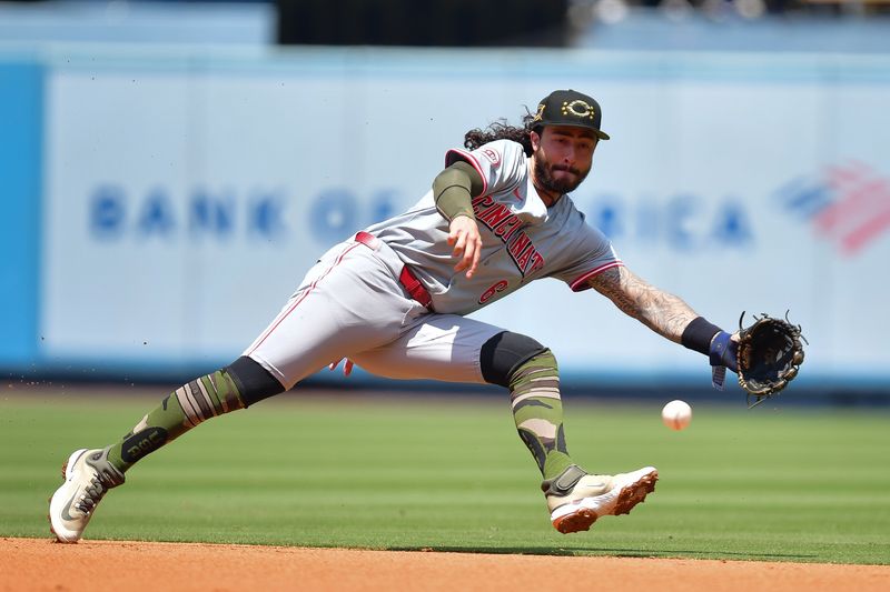 May 19, 2024; Los Angeles, California, USA; Cincinnati Reds second base Jonathan India (6) fields the ground ball of Los Angeles Dodgers right fielder Jason Heyward (23) during the second inning at Dodger Stadium. Mandatory Credit: Gary A. Vasquez-USA TODAY Sports