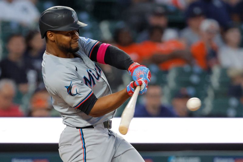 May 13, 2024; Detroit, Michigan, USA;  Miami Marlins third base Otto Lopez (61) hits a two run home run in the eighth inning against the Detroit Tigers at Comerica Park. Mandatory Credit: Rick Osentoski-USA TODAY Sports