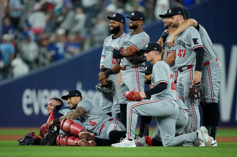 May 10, 2024; Toronto, Ontario, CAN; The Minnesota Twins pose for a photo following a win over theToronto Blue Jays at Rogers Centre. Mandatory Credit: John E. Sokolowski-USA TODAY Sports