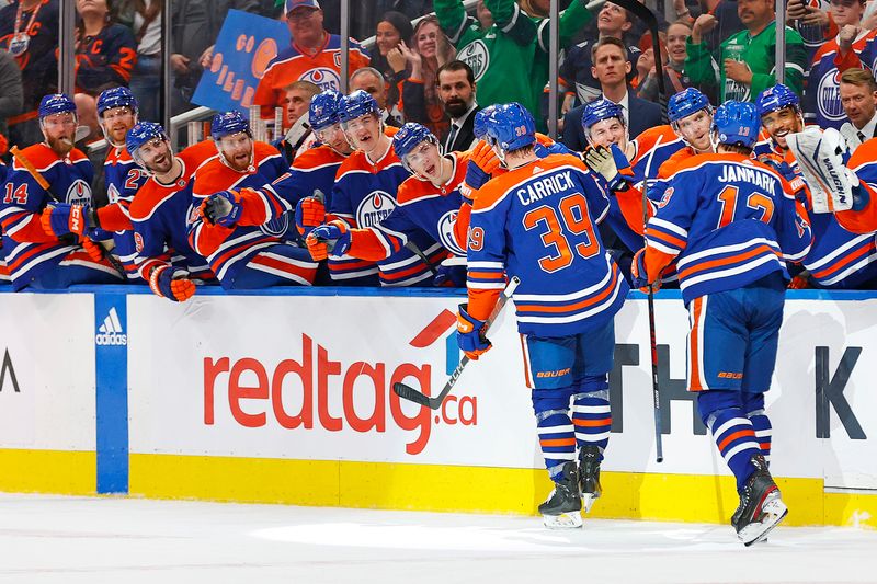 Mar 16, 2024; Edmonton, Alberta, CAN; The Edmonton Oilers celebrate a goal scored by forward Sam Carrick (39) during the third period against the Colorado Avalanche at Rogers Place. Mandatory Credit: Perry Nelson-USA TODAY Sports