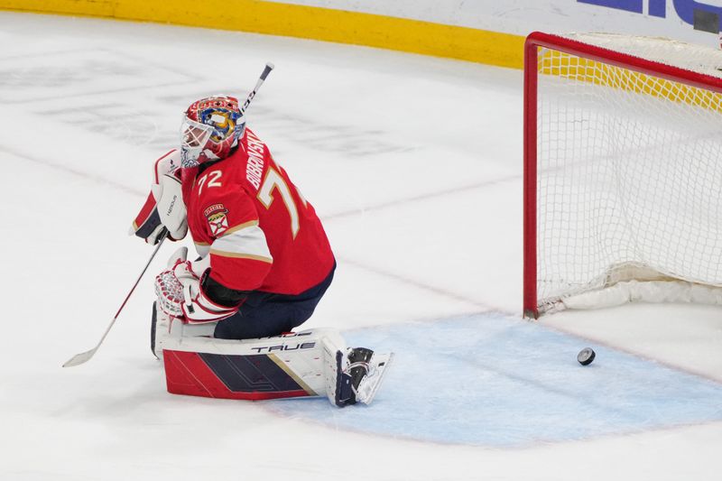 Mar 26, 2024; Sunrise, Florida, USA; A shot by Boston Bruins center Trent Frederic gets by Florida Panthers goaltender Sergei Bobrovsky (72) for a goal during the third period at Amerant Bank Arena. Mandatory Credit: Jim Rassol-USA TODAY Sports