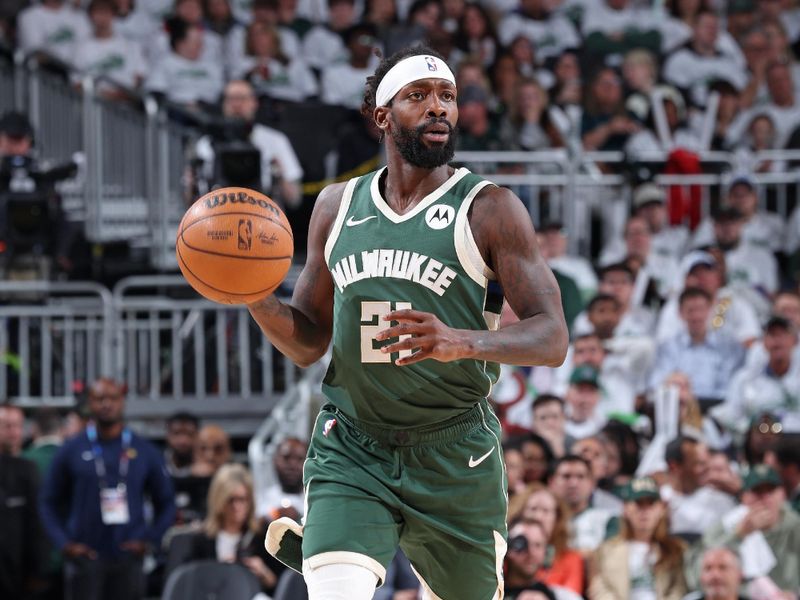 MILWAUKEE, WI - APRIL 23: Patrick Beverley #21 of the Milwaukee Bucks brings the ball up court during Round 1 Game 2 of the 2024 NBA Playoffs against the Indiana Pacers on April 23, 2024 at the Fiserv Forum Center in Milwaukee, Wisconsin. NOTE TO USER: User expressly acknowledges and agrees that, by downloading and or using this Photograph, user is consenting to the terms and conditions of the Getty Images License Agreement. Mandatory Copyright Notice: Copyright 2024 NBAE (Photo by Jeff Haynes/NBAE via Getty Images).