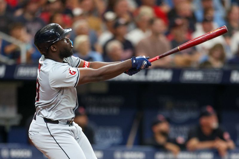 Jul 13, 2024; St. Petersburg, Florida, USA; Cleveland Guardians outfielder Jhonkensy Noel (43) hits a two run home run against the Tampa Bay Rays in the eighth inning  at Tropicana Field. Mandatory Credit: Nathan Ray Seebeck-USA TODAY Sports