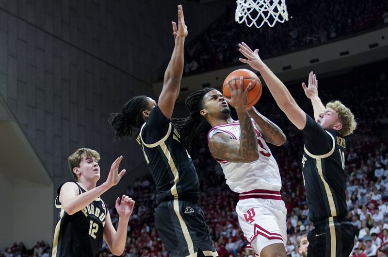 Jan 27, 2026; Bloomington, Indiana, USA; Indiana Hoosiers guard Lamar Wilkerson (3) goes to the basket against Purdue Boilermakers guard Jack Benter (14) during the first half at Simon Skjodt Assembly Hall. Mandatory Credit: Robert Goddin-Imagn Images