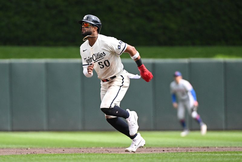 Sep 10, 2023; Minneapolis, Minnesota, USA; Minnesota Twins left fielder Willi Castro (50) runs to third base safely against the New York Mets in the fourth inning at Target Field. Mandatory Credit: Michael McLoone-USA TODAY Sports