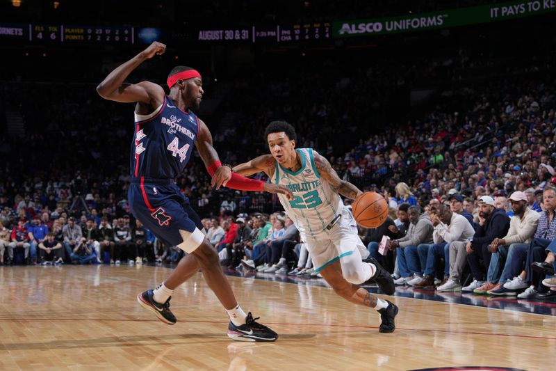 PHILADELPHIA, PA - MARCH 16:  Tre Mann #23 of the Charlotte Hornets dribbles the ball during the game against the Philadelphia 76ers on March 16, 2024 at the Wells Fargo Center in Philadelphia, Pennsylvania NOTE TO USER: User expressly acknowledges and agrees that, by downloading and/or using this Photograph, user is consenting to the terms and conditions of the Getty Images License Agreement. Mandatory Copyright Notice: Copyright 2024 NBAE (Photo by Jesse D. Garrabrant/NBAE via Getty Images)