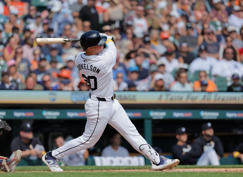 Sep 1, 2024; Detroit, Michigan, USA;  Detroit Tigers first base Spencer Torkelson (20) hits a two run home run in the fifth inning against the Boston Red Sox at Comerica Park. Mandatory Credit: Rick Osentoski-USA TODAY Sports