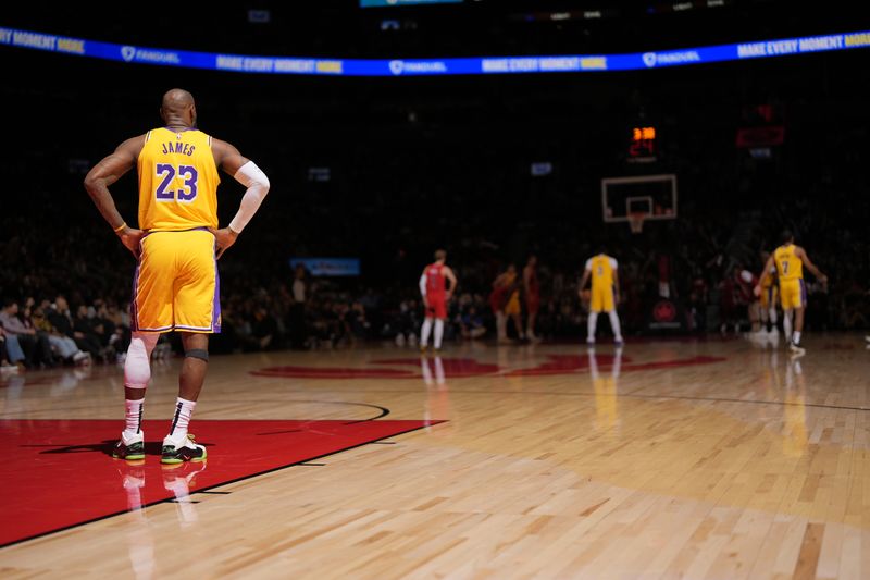 TORONTO, CANADA - NOVEMBER 1: LeBron James #23 of the Los Angeles Lakers looks on during the game against the Toronto Raptors on November 1, 2024 at the Scotiabank Arena in Toronto, Ontario, Canada.  NOTE TO USER: User expressly acknowledges and agrees that, by downloading and or using this Photograph, user is consenting to the terms and conditions of the Getty Images License Agreement.  Mandatory Copyright Notice: Copyright 2024 NBAE (Photo by Mark Blinch/NBAE via Getty Images)