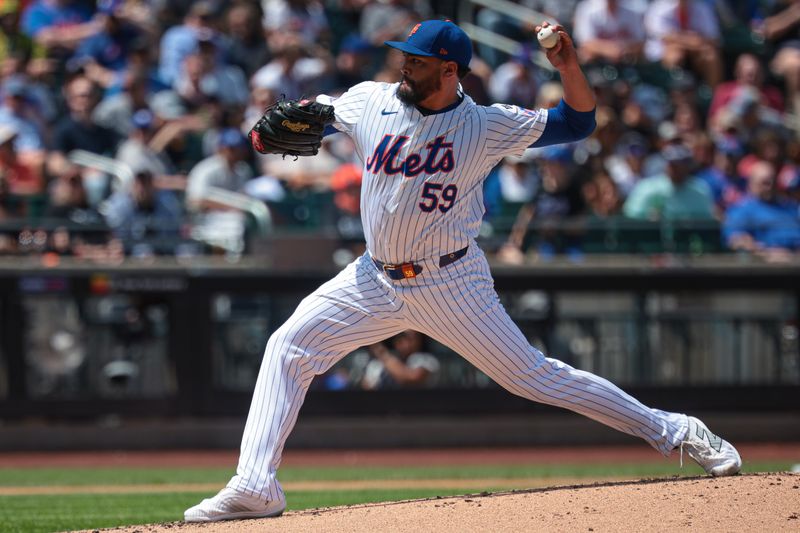 Aug 21, 2024; New York City, New York, USA; New York Mets starting pitcher Sean Manaea (59) delivers a pitch during the second inning against the Baltimore Orioles at Citi Field. Mandatory Credit: Vincent Carchietta-USA TODAY Sports