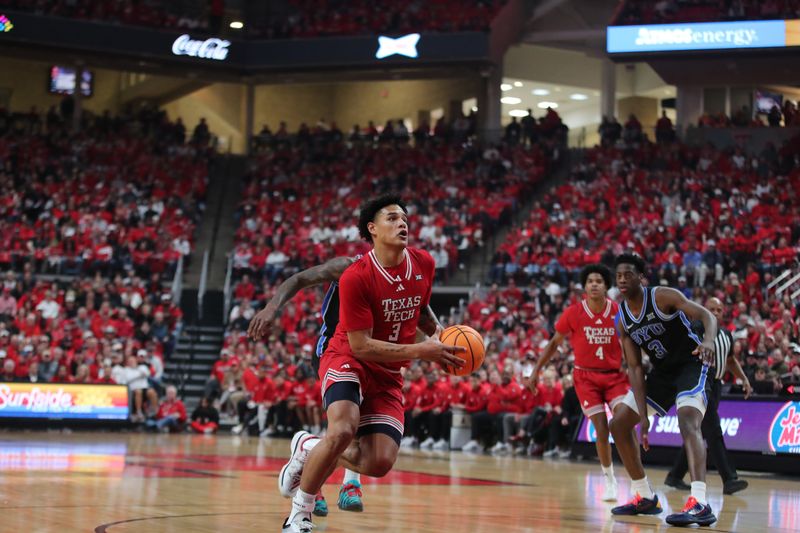 Jan 17, 2026; Lubbock, Texas, USA;  Texas Tech Red Raiders forward LeJuan Watts (3) drives to the top of the key against the BYU Cougars in the first half at United Supermarkets Arena. Mandatory Credit: Michael C. Johnson-Imagn Images