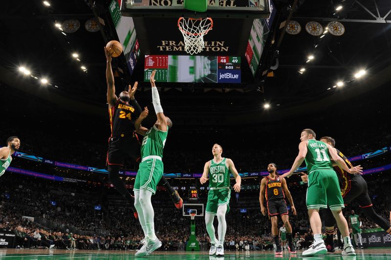 BOSTON, MA - FEBRUARY 7: Bruno Fernando #24 of the Atlanta Hawks drives to the basket during the game against the Boston Celtics on February 7, 2024 at the TD Garden in Boston, Massachusetts. NOTE TO USER: User expressly acknowledges and agrees that, by downloading and or using this photograph, User is consenting to the terms and conditions of the Getty Images License Agreement. Mandatory Copyright Notice: Copyright 2024 NBAE  (Photo by Brian Babineau/NBAE via Getty Images)