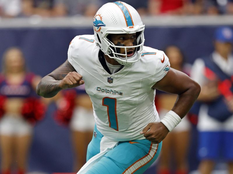 Miami Dolphins quarterback Tua Tagovailoa (1) in action during an NFL preseason football game against the Houston Texans, Saturday, Aug. 19, 2023, in Houston. (AP Photo/Tyler Kaufman)