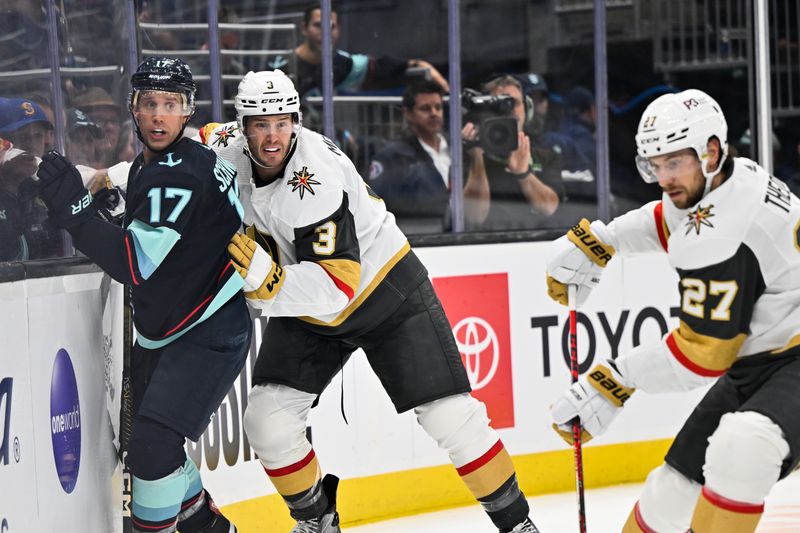 Oct 15, 2022; Seattle, Washington, USA; Vegas Golden Knights defenseman Brayden McNabb (3) checks Seattle Kraken center Jaden Schwartz (17) into the glass during the third periord at Climate Pledge Arena. Vegas defeated defeated Seattle 5-2. Mandatory Credit: Steven Bisig-USA TODAY Sports