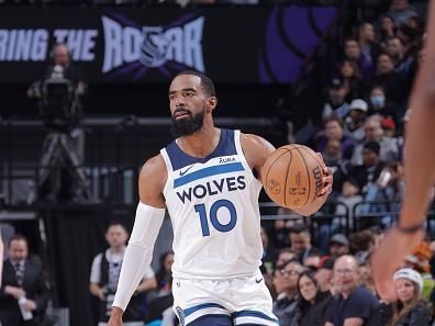 SACRAMENTO, CA - DECEMBER 23: Mike Conley #10 of the Minnesota Timberwolves dribbles the ball during the game against the Sacramento Kings on December 23, 2023 at Golden 1 Center in Sacramento, California. NOTE TO USER: User expressly acknowledges and agrees that, by downloading and or using this Photograph, user is consenting to the terms and conditions of the Getty Images License Agreement. Mandatory Copyright Notice: Copyright 2023 NBAE (Photo by Rocky Widner/NBAE via Getty Images)