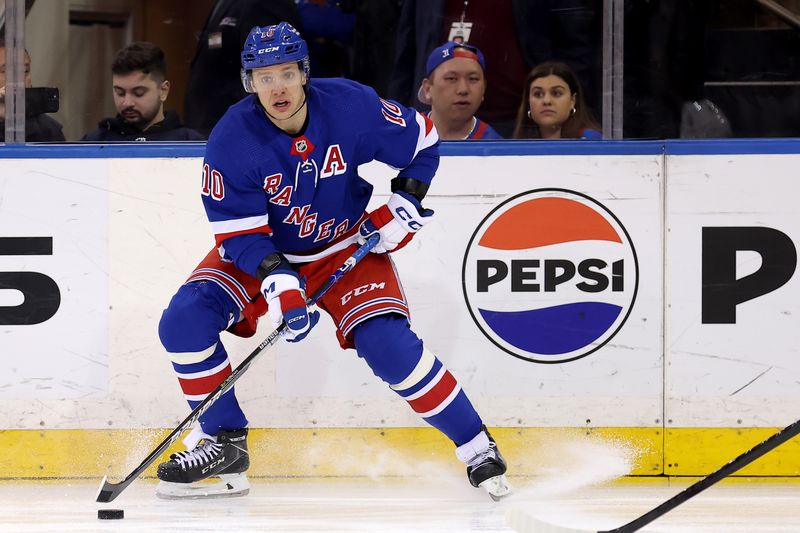 Mar 26, 2024; New York, New York, USA; New York Rangers left wing Artemi Panarin (10) controls the puck against the Philadelphia Flyers during the first period at Madison Square Garden. Mandatory Credit: Brad Penner-USA TODAY Sports