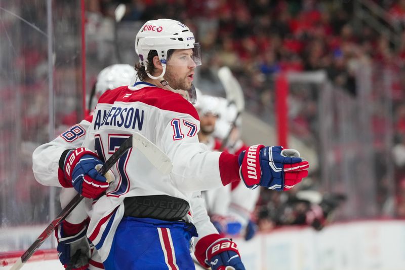 Jan 1, 2026; Raleigh, North Carolina, USA;  Montréal Canadiens right wing Josh Anderson (17) celebrates his goal against the Carolina Hurricanes during the second period at Lenovo Center. Mandatory Credit: James Guillory-Imagn Images