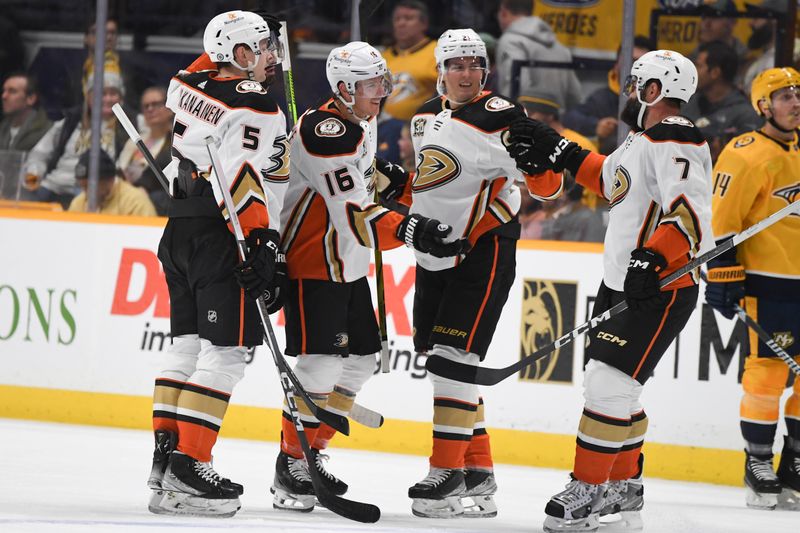 Jan 9, 2024; Nashville, Tennessee, USA; Anaheim Ducks center Ryan Strome (16) is congratulated by teammates after a goal during the first period at Bridgestone Arena. Mandatory Credit: Christopher Hanewinckel-USA TODAY Sports