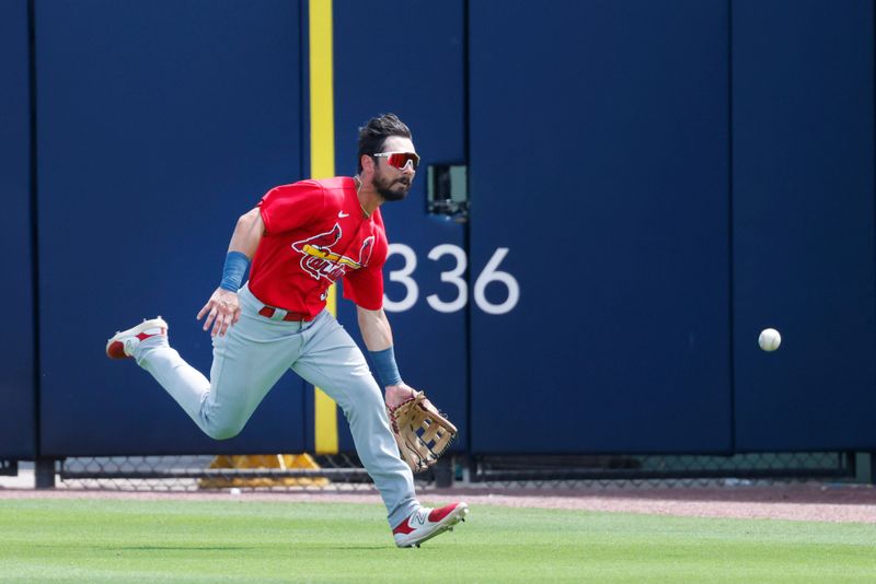 Mar 26, 2023; West Palm Beach, Florida, USA;  St. Louis Cardinals right fielder Scott Hurst cannot get to the ball in time during the fifth inning against the Houston Astros at The Ballpark of the Palm Beaches. Mandatory Credit: Reinhold Matay-USA TODAY Sports