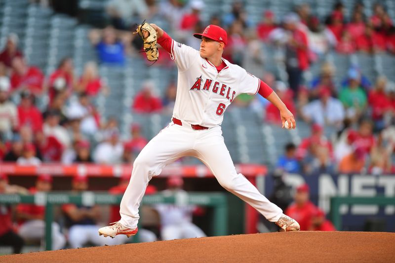 Aug 30, 2024; Anaheim, California, USA; Los Angeles Angels pitcher Samuel Aldegheri (66) throws against the Seattle Mariners during the first inning in his major league debut at Angel Stadium. Mandatory Credit: Gary A. Vasquez-USA TODAY Sports