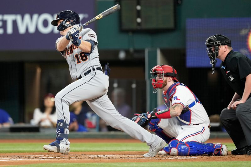 Jun 27, 2023; Arlington, Texas, USA; Detroit Tigers third baseman Tyler Nevin (18) follows through on his RBI single against the Texas Rangers during the second inning at Globe Life Field. Mandatory Credit: Jim Cowsert-USA TODAY Sports