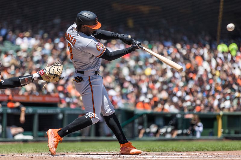 Jun 4, 2023; San Francisco, California, USA;  Baltimore Orioles shortstop Jorge Mateo (3) hits a single against the San Francisco Giants during the third inning at Oracle Park. Mandatory Credit: John Hefti-USA TODAY Sports