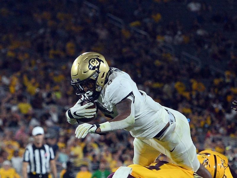 Sep 25, 2021; Tempe, Arizona, USA; Colorado Buffaloes running back Alex Fontenot (8) dives forward against the Arizona State Sun Devils during the second half at Sun Devil Stadium. Mandatory Credit: Joe Camporeale-USA TODAY Sports