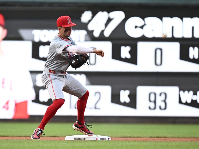 Aug 10, 2024; Washington, District of Columbia, USA;  Los Angeles Angels shortstop Zach Neto (9) throws to first base for a double play against the Washington Nationals during the first inning at Nationals Park. Mandatory Credit: James A. Pittman-USA TODAY Sports