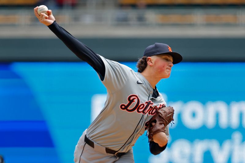 Apr 20, 2024; Minneapolis, Minnesota, USA; Detroit Tigers starting pitcher Reese Olson (45) throws to the Minnesota Twins in the first inning at Target Field. Mandatory Credit: Bruce Kluckhohn-USA TODAY Sports