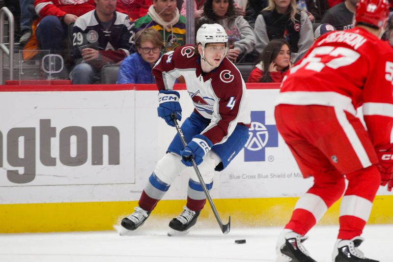 Mar 18, 2023; Detroit, Michigan, USA; Colorado Avalanche defenseman Bowen Byram (4) handles the puck against the Detroit Red Wings during the third period at Little Caesars Arena. Mandatory Credit: Brian Bradshaw Sevald-USA TODAY Sports