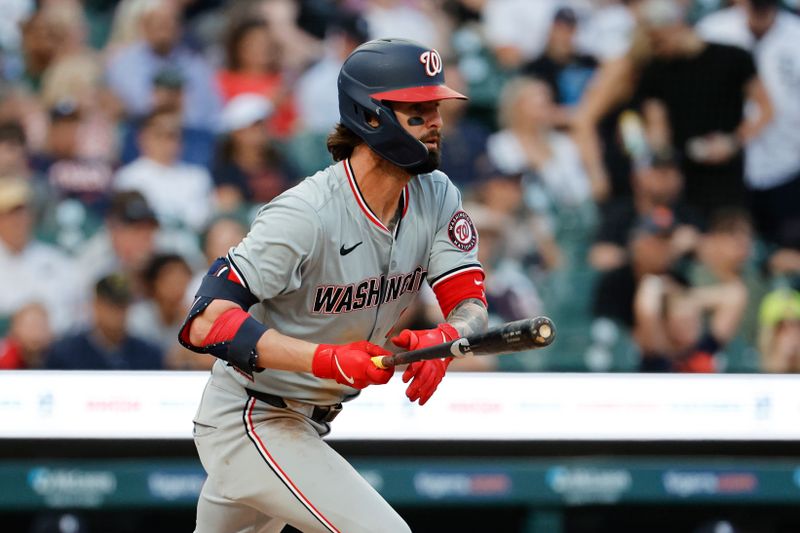 Jun 12, 2024; Detroit, Michigan, USA;  Washington Nationals left fielder Jesse Winker (6) hits a RBI single in the fifth inning against the Detroit Tigers at Comerica Park. Mandatory Credit: Rick Osentoski-USA TODAY Sports