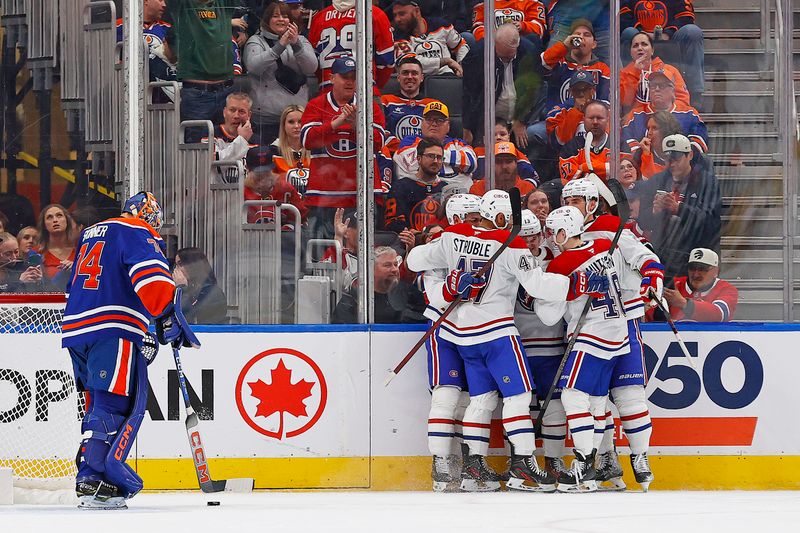 Mar 6, 2025; Edmonton, Alberta, CAN; The Montreal Canadiens celebrate a goal scored by  forward Cole Caufield (13) during the first period against the Edmonton Oilers at Rogers Place. Mandatory Credit: Perry Nelson-Imagn Images