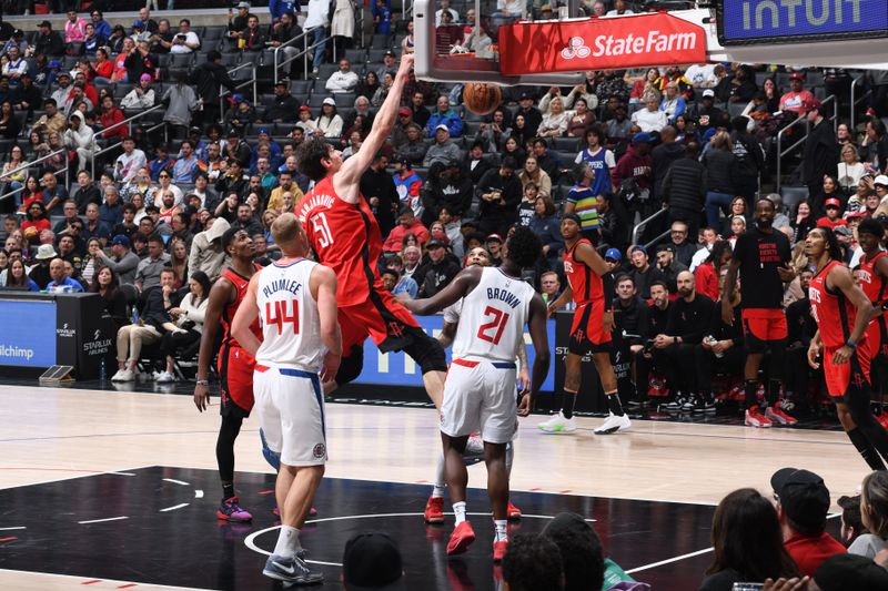 LOS ANGELES, CA - APIRL 14: Boban Marjanovic #51 of the Houston Rockets dunks the ball during the game against the LA Clippers on April 14, 2024 at Crypto.Com Arena in Los Angeles, California. NOTE TO USER: User expressly acknowledges and agrees that, by downloading and/or using this Photograph, user is consenting to the terms and conditions of the Getty Images License Agreement. Mandatory Copyright Notice: Copyright 2024 NBAE (Photo by Adam Pantozzi/NBAE via Getty Images)