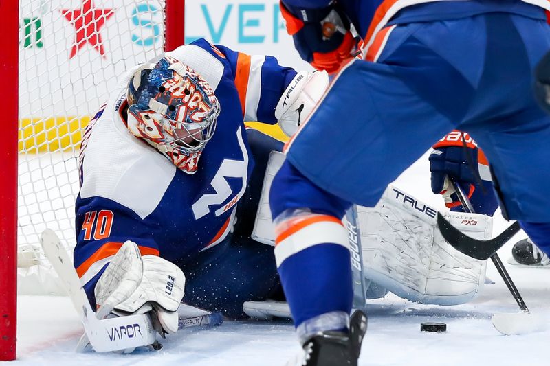 Apr 6, 2024; Elmont, New York, USA; New York Islanders goaltender Semyon Varlamov (40) makes a save against Nashville Predators during the third period at UBS Arena. Mandatory Credit: Tom Horak-USA TODAY Sports