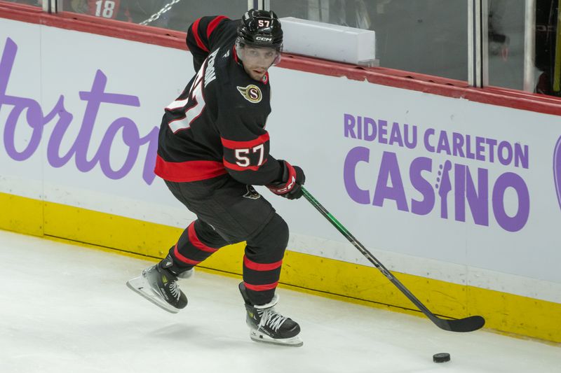 Nov 19, 2024; Ottawa, Ontario, CAN; Ottawa Senators left wing David Perron (57) skates with the puck in the third period against the Edmonton Oilers at the Canadian Tire Centre. Mandatory Credit: Marc DesRosiers-Imagn Images