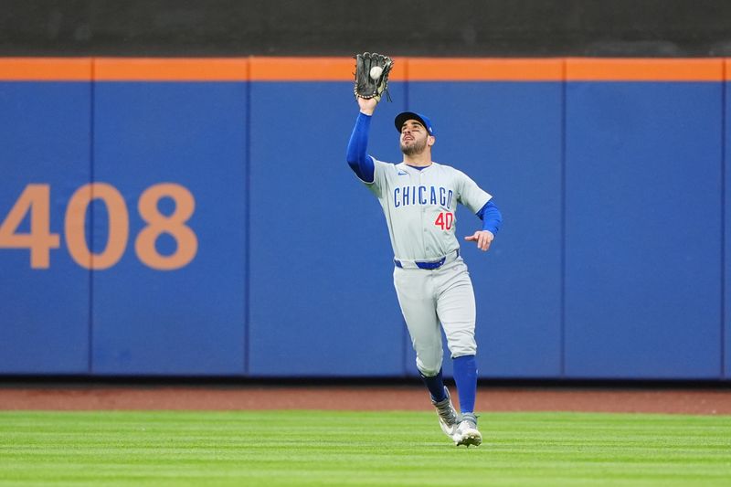 Apr 30, 2024; New York City, New York, USA; Chicago Cubs center fielder Mike Tauchman (40) catches a fly ball hit by New York Mets first baseman Pete Alonso (not pictured) during the first inning at Citi Field. Mandatory Credit: Gregory Fisher-USA TODAY Sports