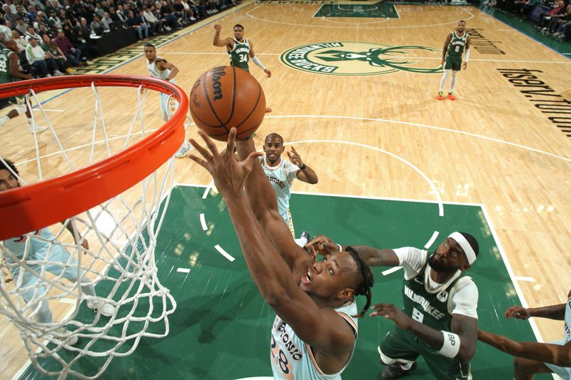 MILWAUKEE, WI - JANUARY 8: Charles Bassey #28 of the San Antonio Spurs rebounds during the game against the Milwaukee Bucks on January 8, 2025 at the Fiserv Forum Center in Milwaukee, Wisconsin. NOTE TO USER: User expressly acknowledges and agrees that, by downloading and or using this Photograph, user is consenting to the terms and conditions of the Getty Images License Agreement. Mandatory Copyright Notice: Copyright 2025 NBAE (Photo by Gary Dineen/NBAE via Getty Images).