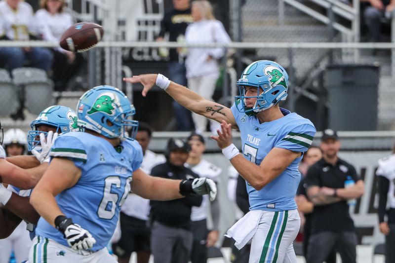 Nov 6, 2021; Orlando, Florida, USA; Tulane Green Wave quarterback Michael Pratt (7) throws a pass during the first quarter against the UCF Knights at Bounce House. Mandatory Credit: Mike Watters-USA TODAY Sports