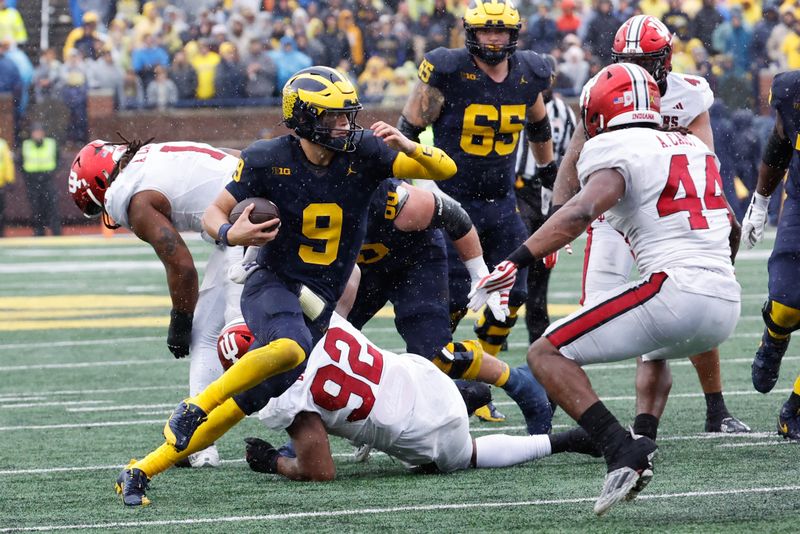 Oct 14, 2023; Ann Arbor, Michigan, USA; Michigan Wolverines quarterback J.J. McCarthy (9) rushes in the second half against the Indiana Hoosiers at Michigan Stadium. Mandatory Credit: Rick Osentoski-USA TODAY Sports