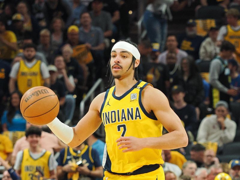 INDIANAPOLIS, IN - APRIL 28: Andrew Nembhard #2 of the Indiana Pacers brings the ball up court during the game against the Milwaukee Bucks during Round 1 Game 4 of the 2024 NBA Playoffs on April 28, 2024 at Gainbridge Fieldhouse in Indianapolis, Indiana. NOTE TO USER: User expressly acknowledges and agrees that, by downloading and or using this Photograph, user is consenting to the terms and conditions of the Getty Images License Agreement. Mandatory Copyright Notice: Copyright 2024 NBAE (Photo by Ron Hoskins/NBAE via Getty Images)