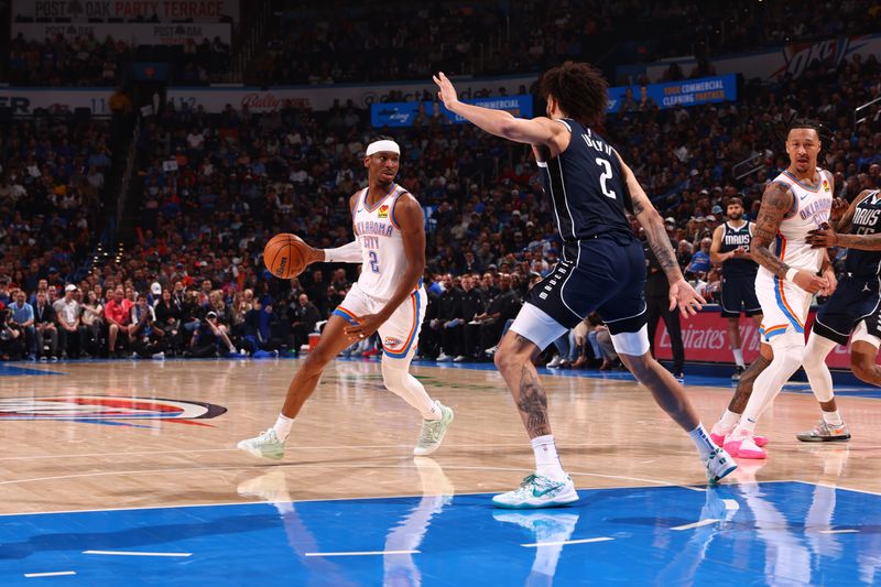 OKLAHOMA CITY, OK - MARCH 14: Shai Gilgeous-Alexander #2 of the Oklahoma City Thunder dribbles the ball during the game against the Dallas Mavericks on March 13, 2024 at Paycom Arena in Oklahoma City, Oklahoma. NOTE TO USER: User expressly acknowledges and agrees that, by downloading and or using this photograph, User is consenting to the terms and conditions of the Getty Images License Agreement. Mandatory Copyright Notice: Copyright 2024 NBAE (Photo by Zach Beeker/NBAE via Getty Images)