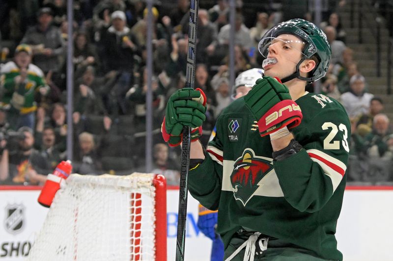 Mar 22, 2025; Saint Paul, Minnesota, USA;  Minnesota Wild forward Marco Rossi (23) celebrates his goal against the Buffalo Sabres during the second period at Xcel Energy Center. Mandatory Credit: Nick Wosika-Imagn Images