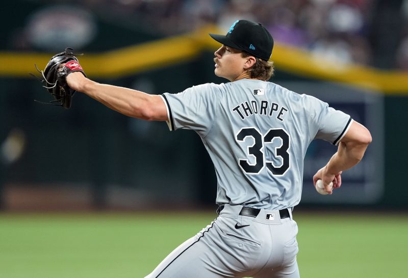 Jun 16, 2024; Phoenix, Arizona, USA; Chicago White Sox pitcher Drew Thorpe (33) pitches against the Arizona Diamondbacks during the first inning at Chase Field. Mandatory Credit: Joe Camporeale-USA TODAY Sports